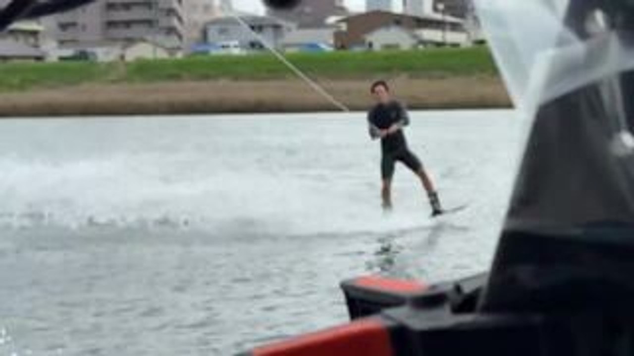 Man Attempts Wakeboarding Trick and Takes Tumble Into Water