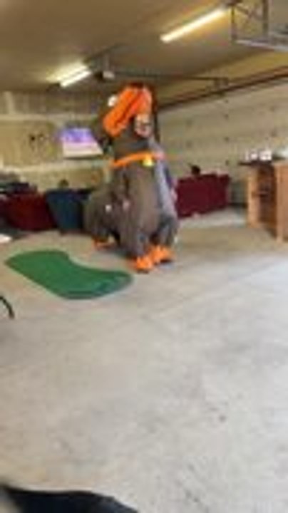 Dog Gets Scared After Man Spins Around in Wiener Dog Costume