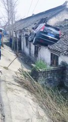 How Did That Happen? Unbelievable Moment Car Drives onto a Rooftop