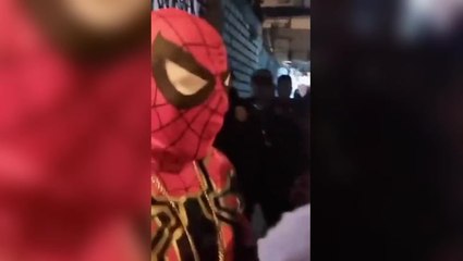 Police officer dressed as Spider-Man finds suspected cocaine in trick-or-treat Halloween bucket