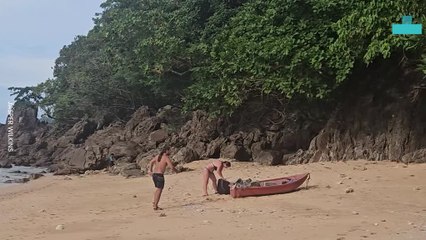 Rescuing an Entangled Crab on a Deserted Beach