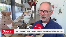 5 bin yıllık kaplarda kadının önemini gösteren gerdanlık detayı