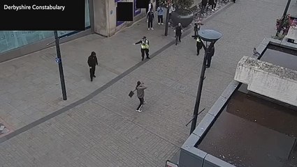 Spade-wielding man tackled to ground by hero bystander