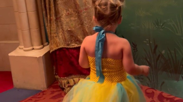 Girl dressed as Flounder bonds with Ariel while playing hide & seek at Disneyland Paris