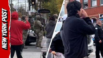 'Get out!': Chicago residents protest immigration raids