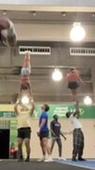 Cheerleader Falls Onto Bystander During Practice Session