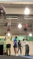 Cheerleader Falls Onto Bystander During Practice Session