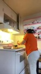 Woman's Cooking Attempt Goes Wrong as Stove Catches Fire