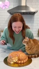 The reaction of a cat when a knife is placed against the body of a fake cat can vary