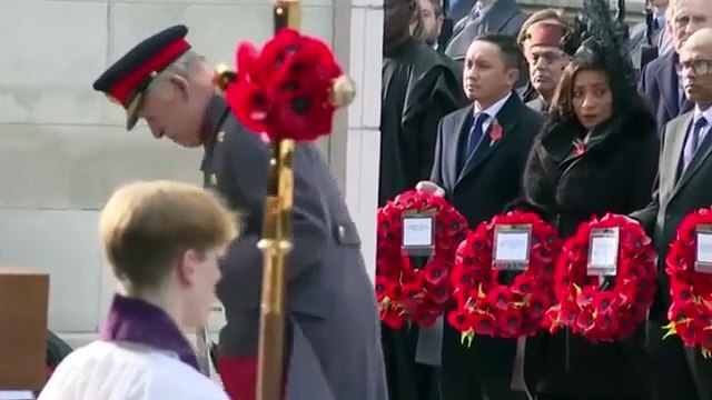 Prince William and King Charles lay wreaths during Remembrance Sunday service