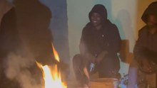 Comical mishap unfolds when family bonfire is interrupted by another fire breaking out