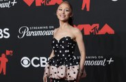 Ariana Grande wants to 'move past' viral comments about the moon landing