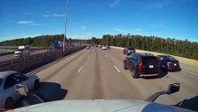 Car Crashes Into Semi-Truck While Overtaking it