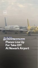Planes Line Up For Take Off At Newark Airport