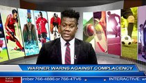 WARNER WARNS AGAINST COMPLACENCY
