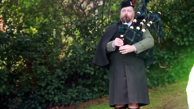 'Amazing Grace' is played by a piper as Minehead marks Armistice Day, filmed by George Ody.