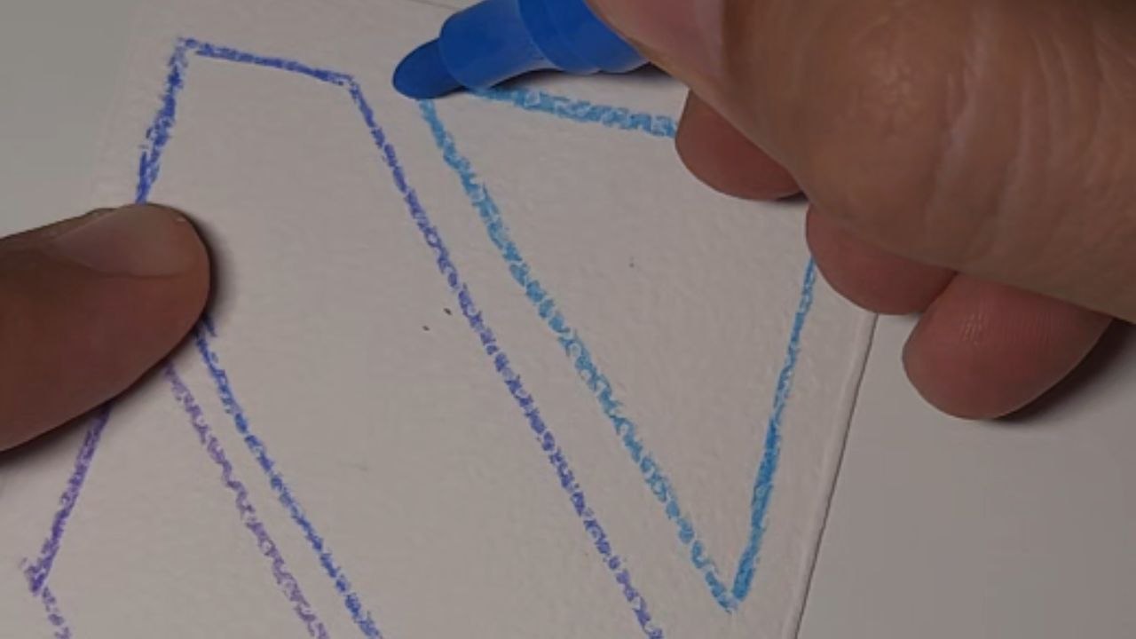 Artist creates a soothing acrylic painting ASMR by filling shapes on a canvas with colors