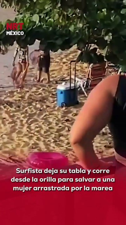 🌊 Sin pensarlo dos veces, un surfista corrió desde la #playa para rescatar a una mujer que luchaba contra la corriente. Su rápida acción evitó una tragedia.