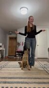 German Shepherd Adorably Spins Around Woman in Joy