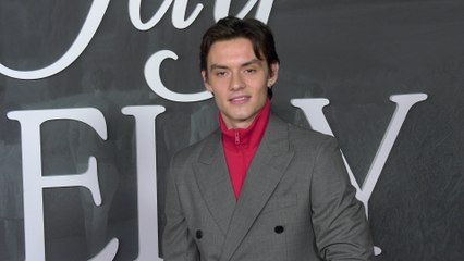 Louis Partridge attends the red carpet premiere of Netflix's "Jay Kelly" in Los Angeles