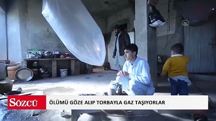 Pakistan'da ölümü göze alıp torbada gaz taşıyorlar