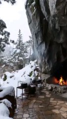 cave mountains resort with parrot.