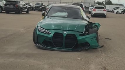 Car shown heavily wrecked in video capturing the aftermath of an accident