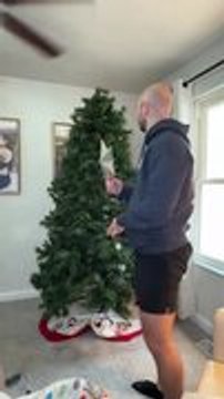 Ceiling Fan Knocks Star Off Christmas Tree as Woman Moves it