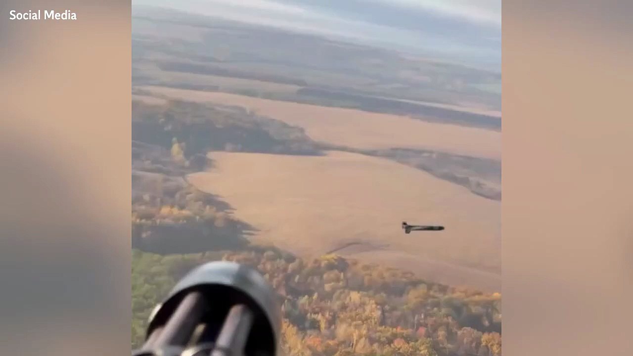 Ukrainian helicopter gunner blasts Russian drone out of the sky with minigun