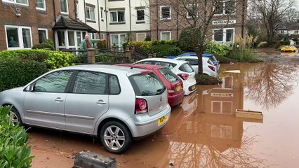 Eight cars were completely submerged under floodwater at the bottom of Homeforge House car park, alongside six mobility scooters.