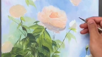 Artist transforms blank canvas into serene masterpiece featuring flowers blooming under blue sky