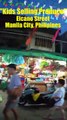 Kids Selling Produce on Elcano Street in Manila City in the Philippines