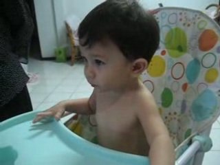 14 months eating in his high chair