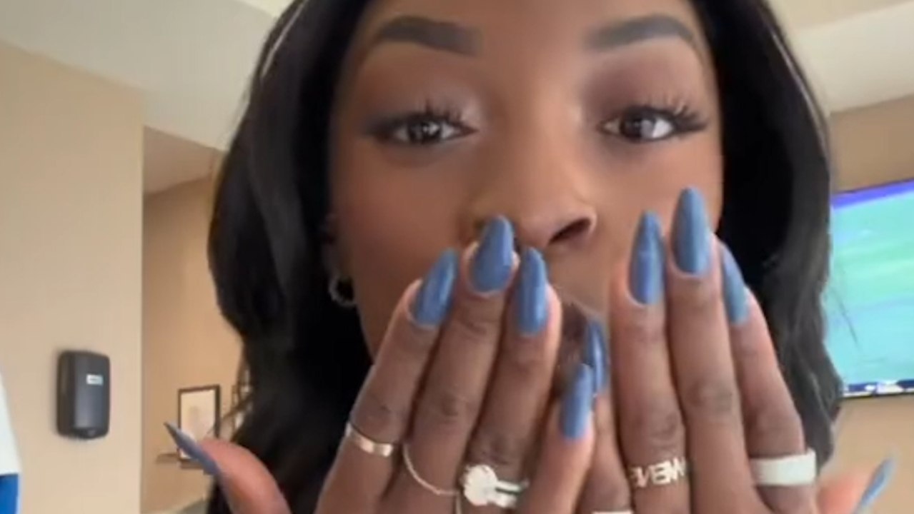 Simone Biles shows off $90K luxury accessory while celebrating Bears win