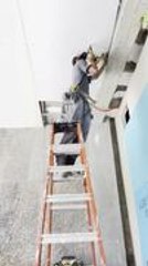 Man Loses Balance While Fixing Ceiling and Falls off Ladder