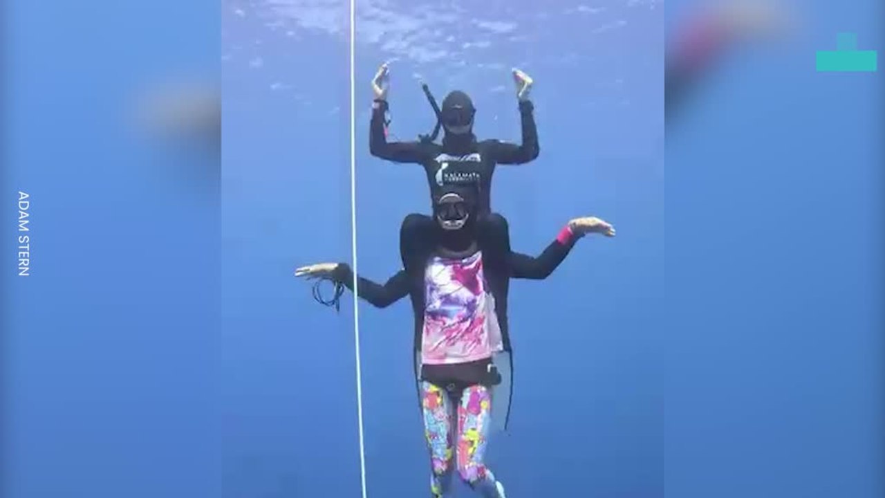 Freedivers Free-dancing on an Underwater Dance Floor