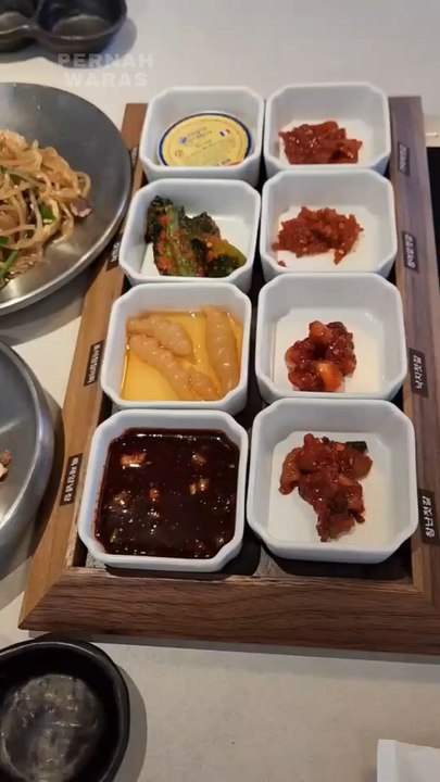 Today's afternoon menu: Several kinds of hot chili sauce. Fried noodles with soy sauce. Vegetable salad. Quail eggs.