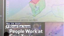 People Work at Gaza Truce Monitoring Center in southern Israel