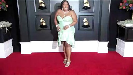 Lizzo Hits The People’s Choice Awards Red Carpet In Stunning Blue Patterned Dress