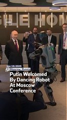 Putin Welcomed By Dancing Robot At Moscow Conference