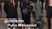 Putin Welcomed By Dancing Robot At Moscow Conference