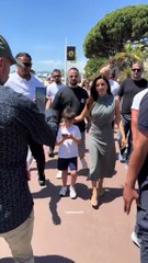Eva Longoria walks along the Croisette in Cannes with her son.