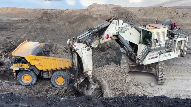 Epic In action Videos of the Liebherr R9350 Excavator Loading Caterpillar Dumper ~ Miningstory