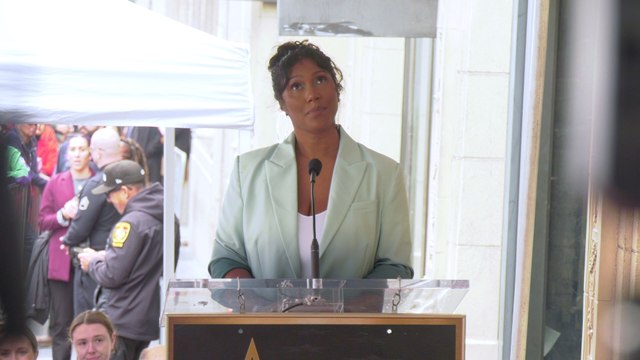 Simone Ledward-Boseman gives a speech at Chadwick Boseman's posthumous Hollywood Walk of Fame star ceremony