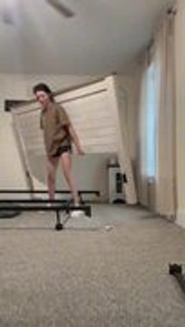 Woman Accidentally Drops Heavy Frame While Lifting It