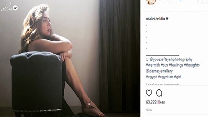 ميّ عز الدين في جلسة تصوير مثيرة وتكشف عن التاتو الجديد