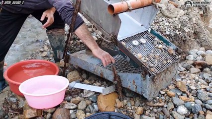 Prospecting For Gold In The River With a Sluice Machine