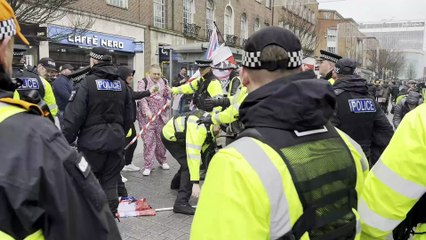 Police handcuff one protester during the British Unity Walk and Exeter is for Everyone clash, video Alan Quick IMG_8792