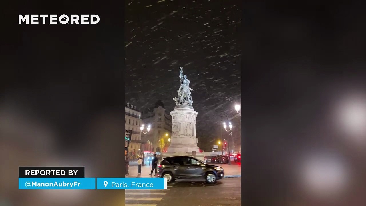 Snow covers the streets of Paris, France