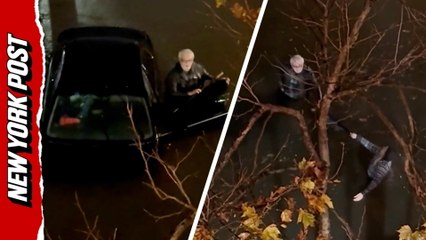 Elderly man rescued after car gets trapped in flash flood waters